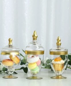 HIER_4610 Chargers & Centerpieces Set Of 3 | Gold Trim Apothecary Jars | Glass Candy Jars With Lids - 9"/9"/8"