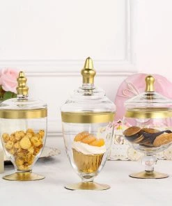 HIER_4610 Chargers & Centerpieces Set Of 3 | Gold Trim Apothecary Jars | Glass Candy Jars With Lids - 9"/9"/8"