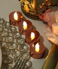 HIER_3720 Chargers & Centerpieces 12 Pack | Metallic Flameless LED Candles | Battery Operated Tea Light Candles | Blush / Rose Gold