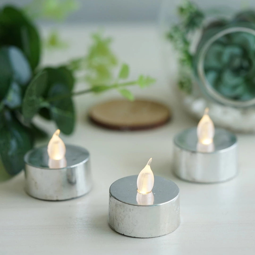 HIER_3720 12 Pack | Metallic Flameless LED Candles | Battery Operated Tea Light Candles | Silver 2 HIER_3720 12 Pack | Metallic Flameless LED Candles | Battery Operated Tea Light Candles | Silver