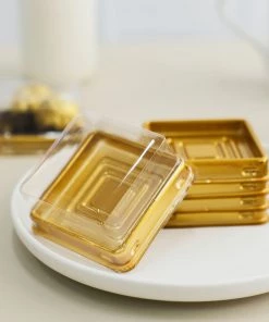 HIER_5410 50 Pack | Gold/Clear 3" Mini Plastic Cupcake Favor Containers, Square Party Boxes Treat Display Holder Disposable Dinnerware