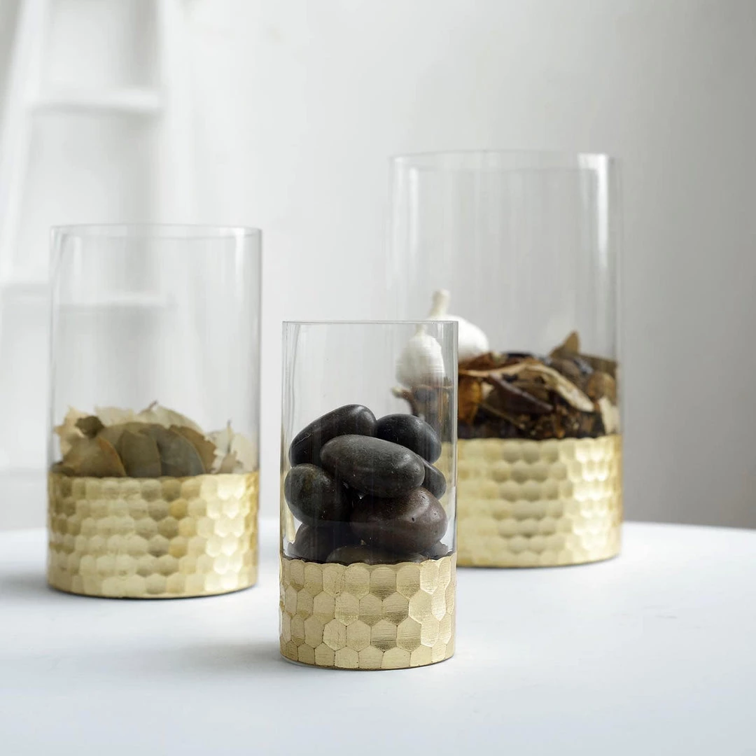 HIER_4810 Chargers & Centerpieces Set Of 3 | Glass Cylinder Vases With Gold Honeycomb Base | Glass Candle Holders | 6" | 8" | 10" 1 HIER_4810 Chargers & Centerpieces Set Of 3 | Glass Cylinder Vases With Gold Honeycomb Base | Glass Candle Holders | 6" | 8" | 10"